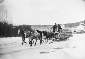 Harry Andersen and Roy Munger hauling logs. (Images are provided for educational and research purposes only. Other use requires permission, please contact the Museum.) thumbnail