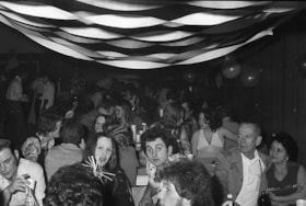 Houston New Year's Eve party, 1976-77. (Images are provided for educational and research purposes only. Other use requires permission, please contact the Museum.) thumbnail