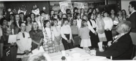 Children singing at Houston Christmas dinner. (Images are provided for educational and research purposes only. Other use requires permission, please contact the Museum.) thumbnail