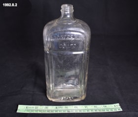 Liquor Bottle. (Images are provided for educational and research purposes only. Other use requires permission, please contact the Museum.) thumbnail