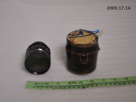 Camera lens and Case. (Images are provided for educational and research purposes only. Other use requires permission, please contact the Museum.) thumbnail