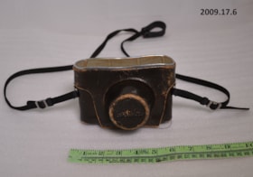 35mm Camera and Case. (Images are provided for educational and research purposes only. Other use requires permission, please contact the Museum.) thumbnail