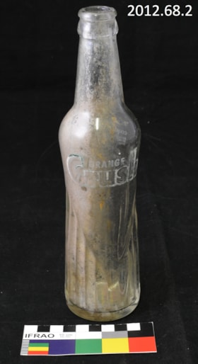 Glass Orange Crush Pop Bottle. (Images are provided for educational and research purposes only. Other use requires permission, please contact the Museum.) thumbnail