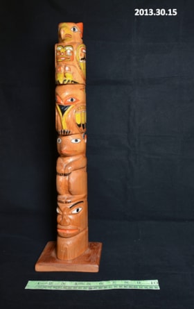 Totem Pole Figurine. (Images are provided for educational and research purposes only. Other use requires permission, please contact the Museum.) thumbnail
