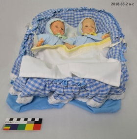Dolls and Basket. (Images are provided for educational and research purposes only. Other use requires permission, please contact the Museum.) thumbnail